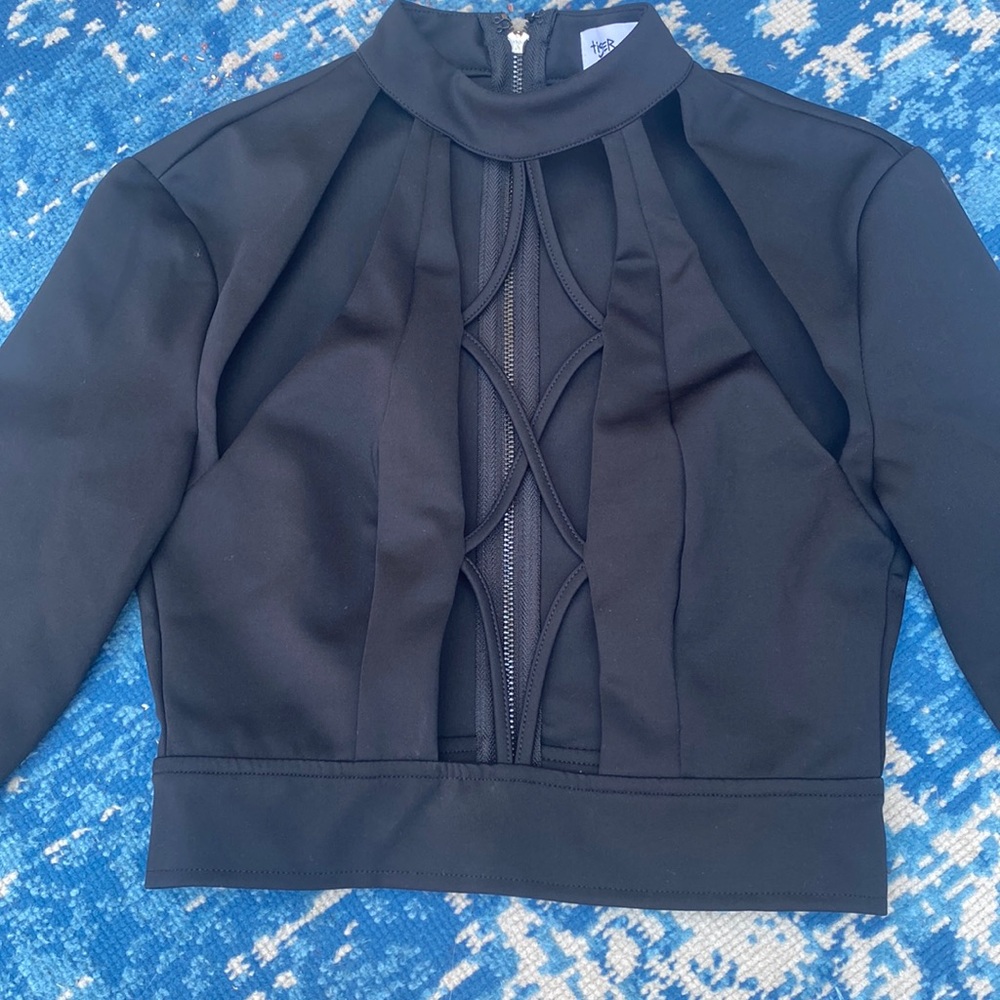 Tiger Mist cropped black top with slit and open front design